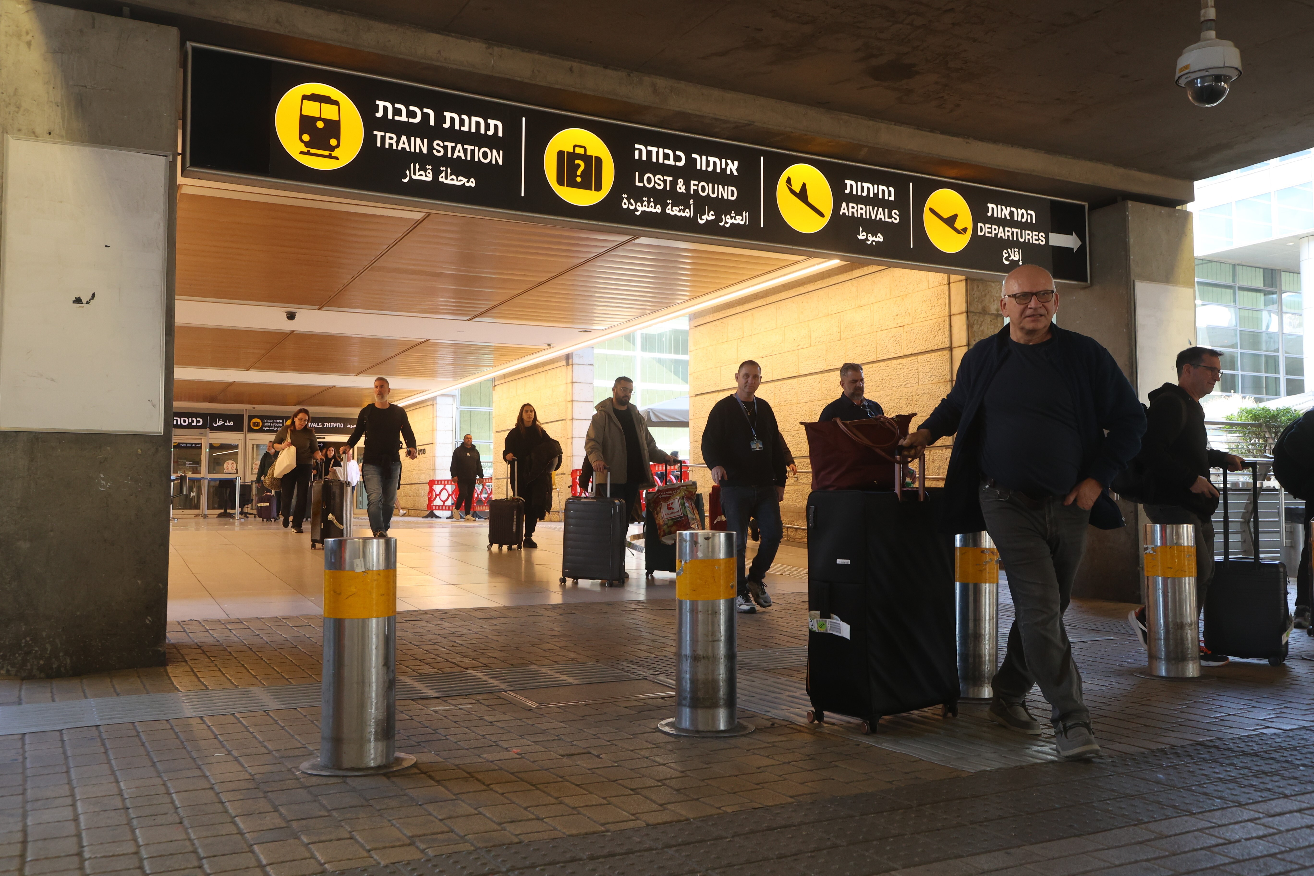Travelers arrive at Ben Gurion Airport near Tel Aviv, Israel, on March 5.